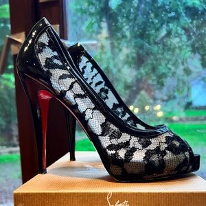 Christian Louboutin Black patent leather and lace 120mm heels. Size 39.